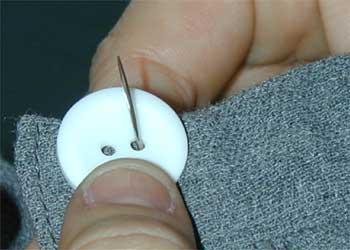 coser boton